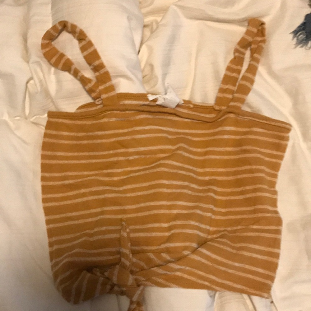 Orange and white striped crop top tank.